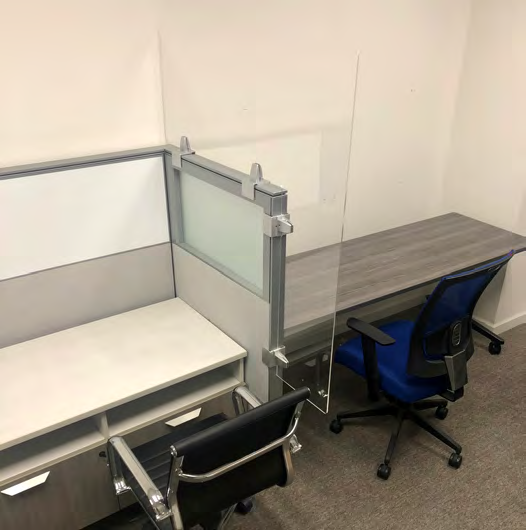 OBEX clear acrylic cubicle separation screen mounted around a workstation corner