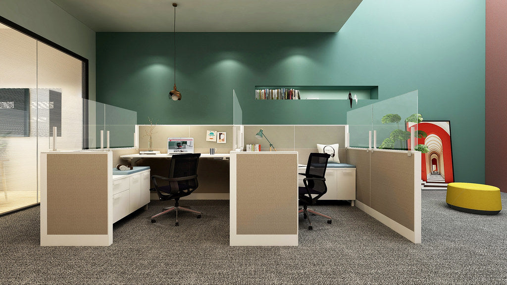 Friant Interra low-panel workstations with glass privacy toppers in a modern office