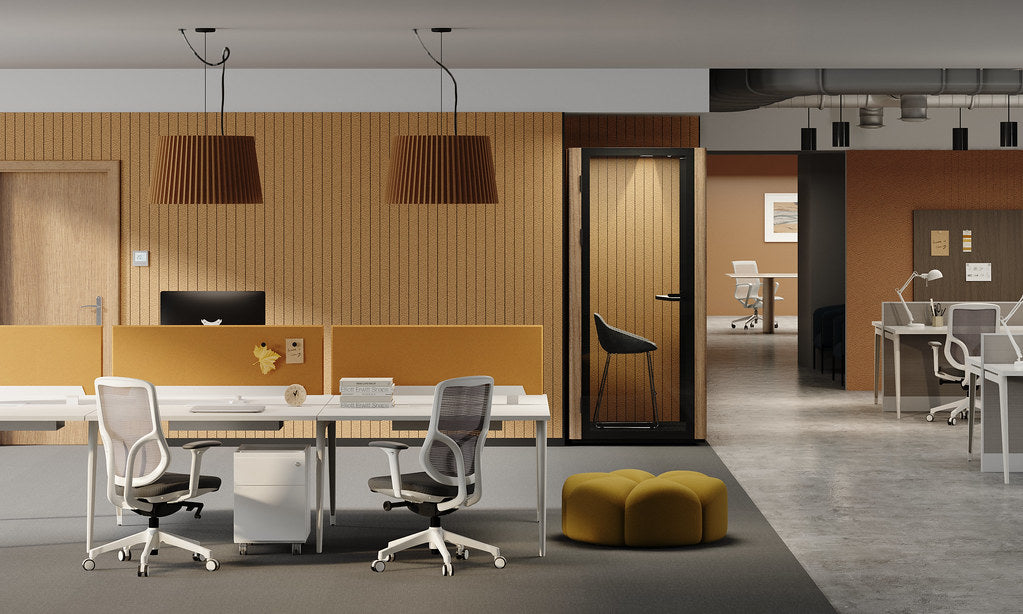 Friant Verity benching in a warm modern office with earth-tone privacy screens