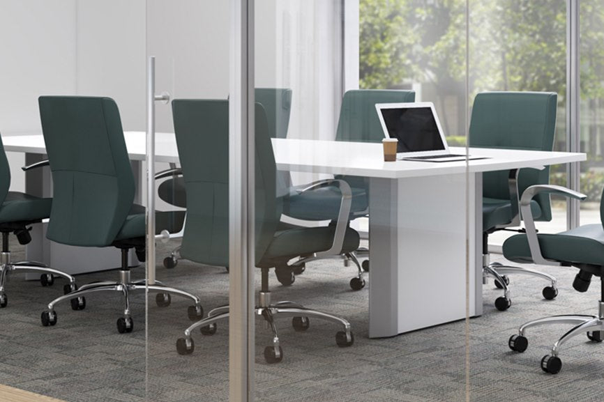 9to5 Cortina executive chairs in a glass conference room