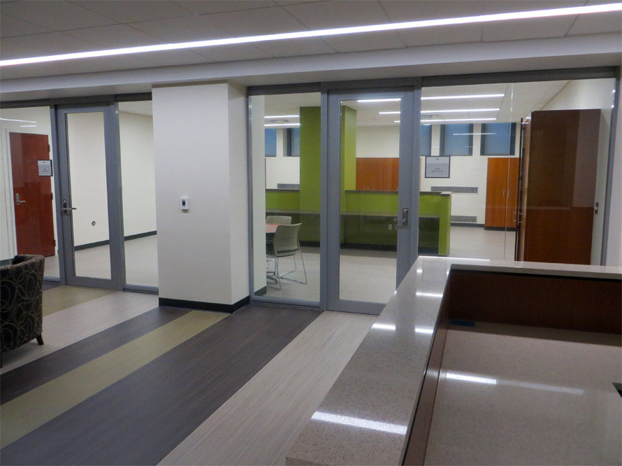 NxtWall View Series glass office front with aluminum swing door